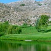 A view over the water of a hole at Hemet Golf Club.