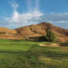 View of a green and bunker at Hidden Valley Golf Club