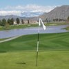 A view of a hole with water in background at Menifee Lakes Country Club