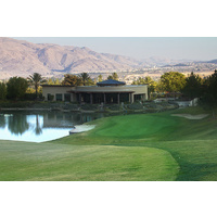 Glen Ivy Golf Club's 16th hole is a par 4 dogleg right to a green, protected by water and two sand bunkers.