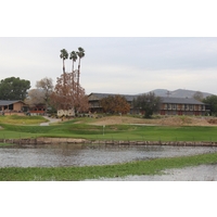 The finishing hole at Carlton Oaks Golf Club sits below the lodge (on the right) and pro shop/restaurant (on the left).